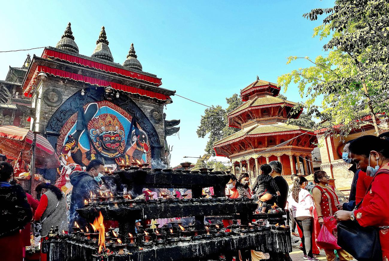 Butter lamps burning at the Kaal Bhairav shrine, Kathmandu Durbar Square
